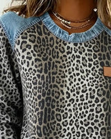 Ruby | Statement denim trui met luipaardpatch