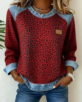 Ruby | Statement denim trui met luipaardpatch