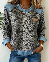 Ruby | Statement denim trui met luipaardpatch