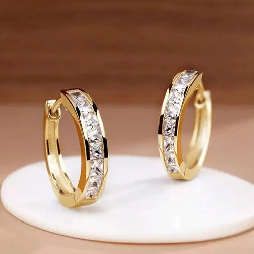Chique Oorbellen met Goud en Kristal
